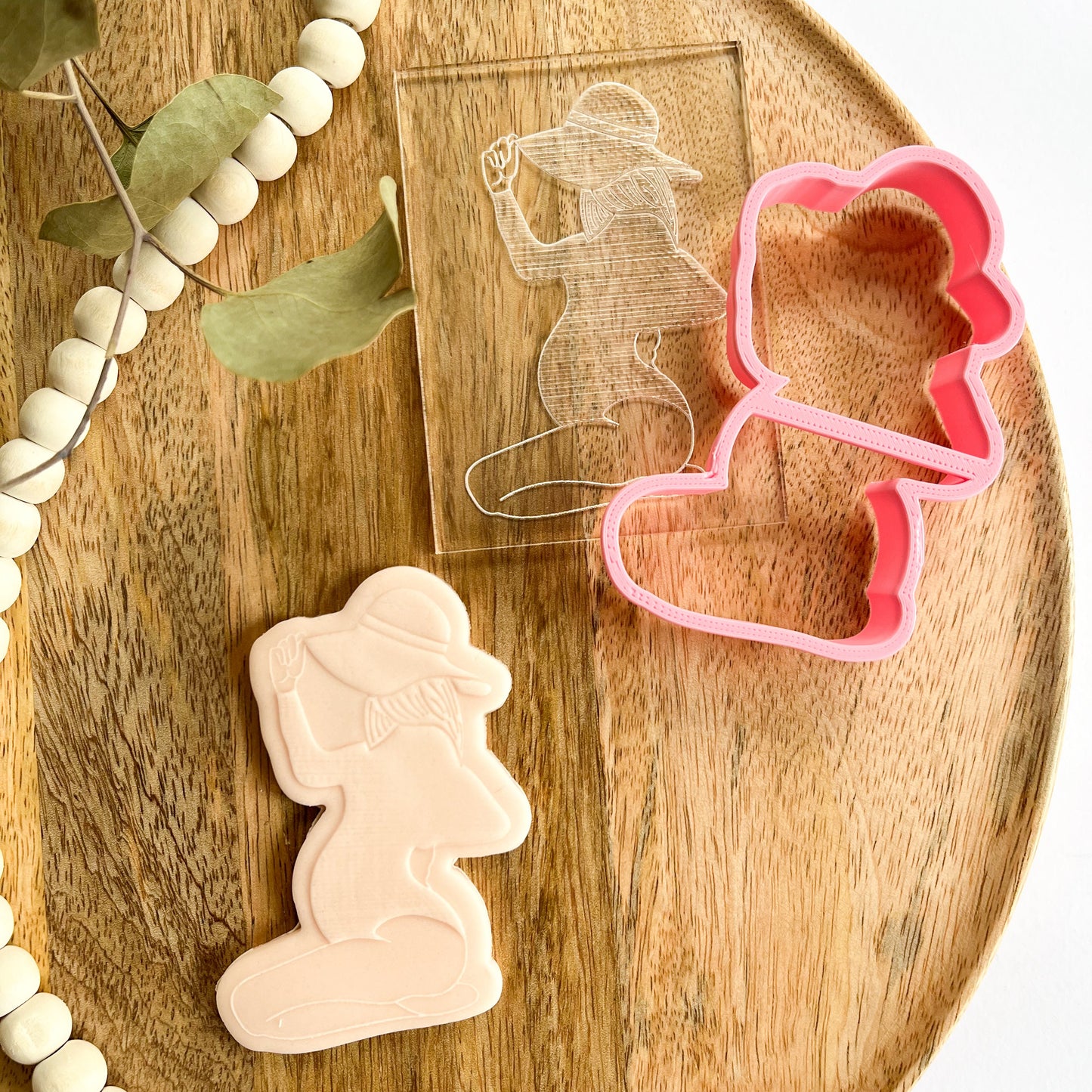 ALT Text:
Pregnant woman silhouette cookie cutter and embosser, ideal for baby showers and maternity-themed cookie decorations.