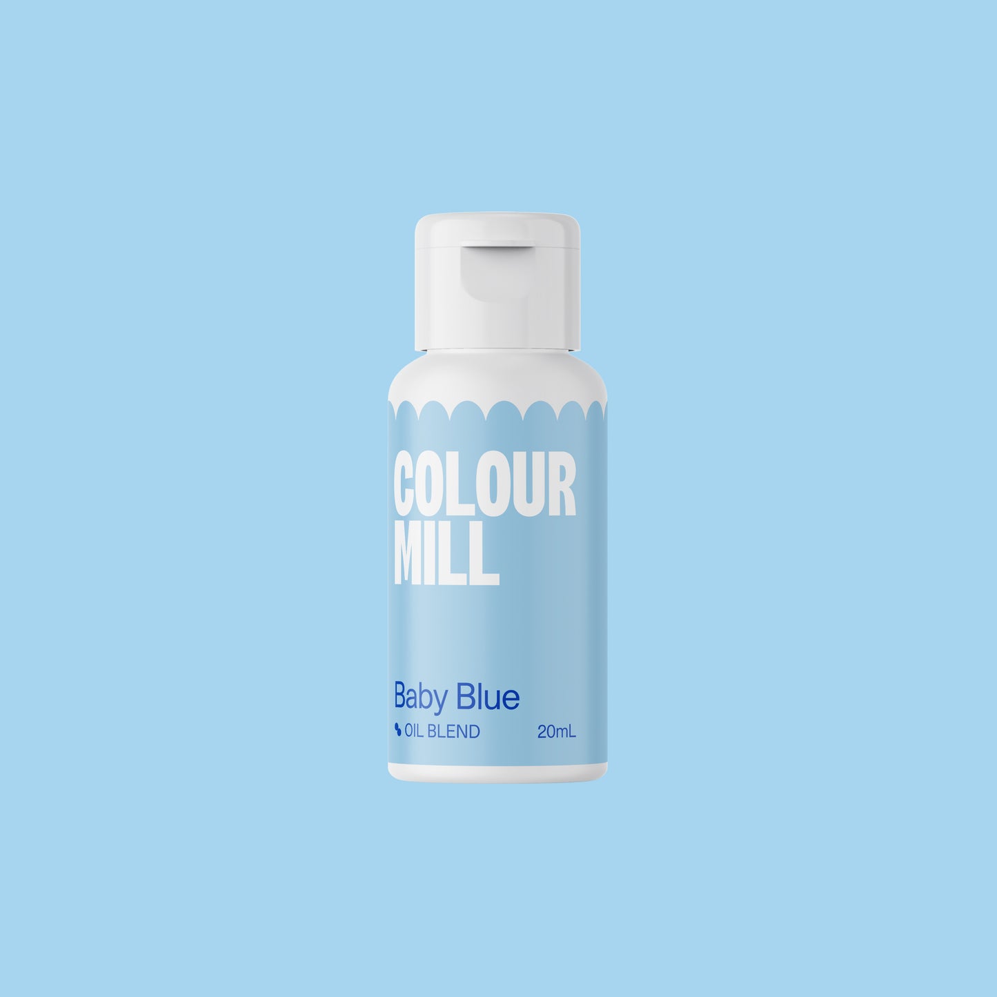 Bottle of Colour Mill Baby Blue hair color on a light blue background