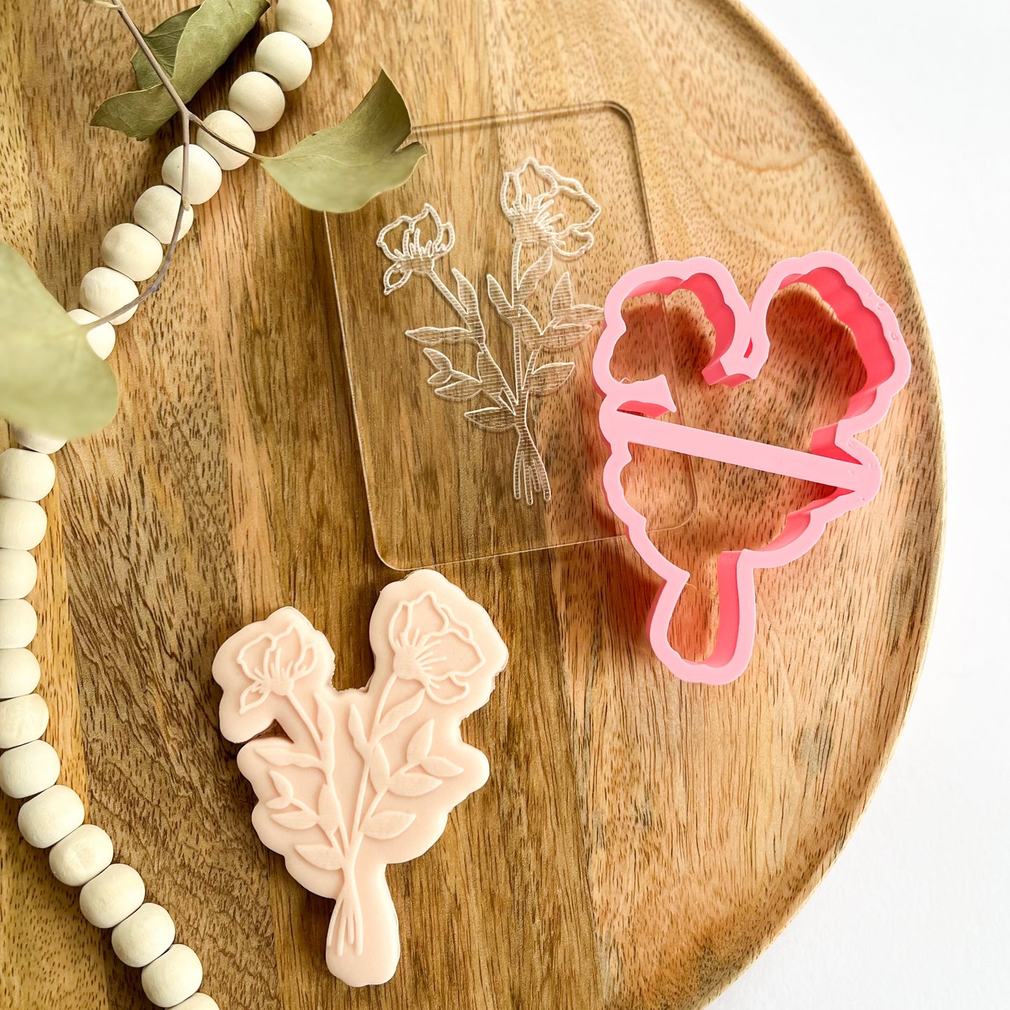 Rose bouquet cookie cutter with detailed floral embosser, perfect for decorating elegant spring, wedding, or Mother's Day cookies.