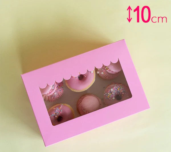 Pink box with a window displaying pink donuts on a light yellow background