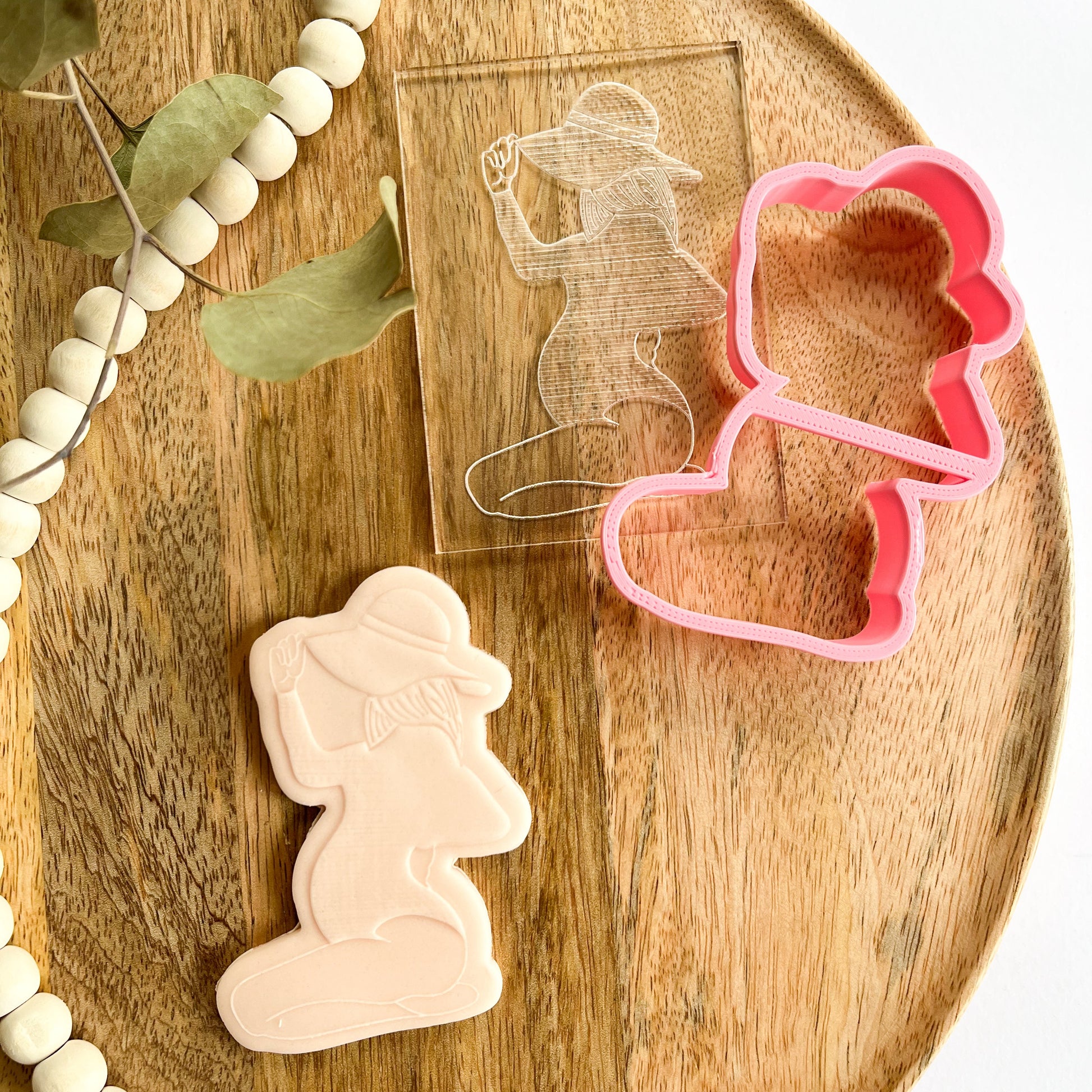 ALT Text:
Pregnant woman silhouette cookie cutter and embosser, ideal for baby showers and maternity-themed cookie decorations.