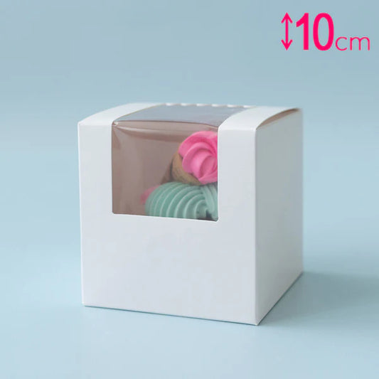 White box with a clear window displaying colorful items on a light blue background, with a measurement label indicating 10cm height.