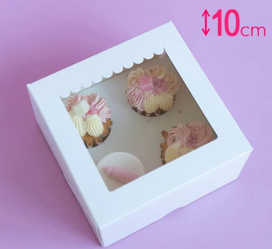 White box with a clear window displaying cupcakes on a pink background