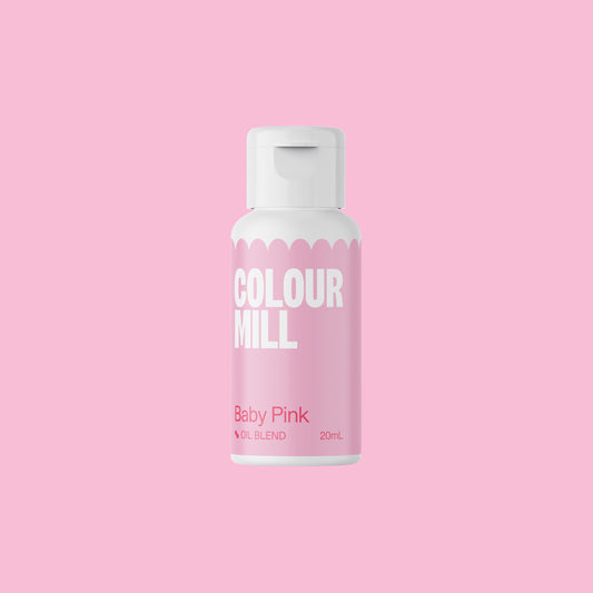 Bottle of Colour Mill Baby Pink hair color on a pink background