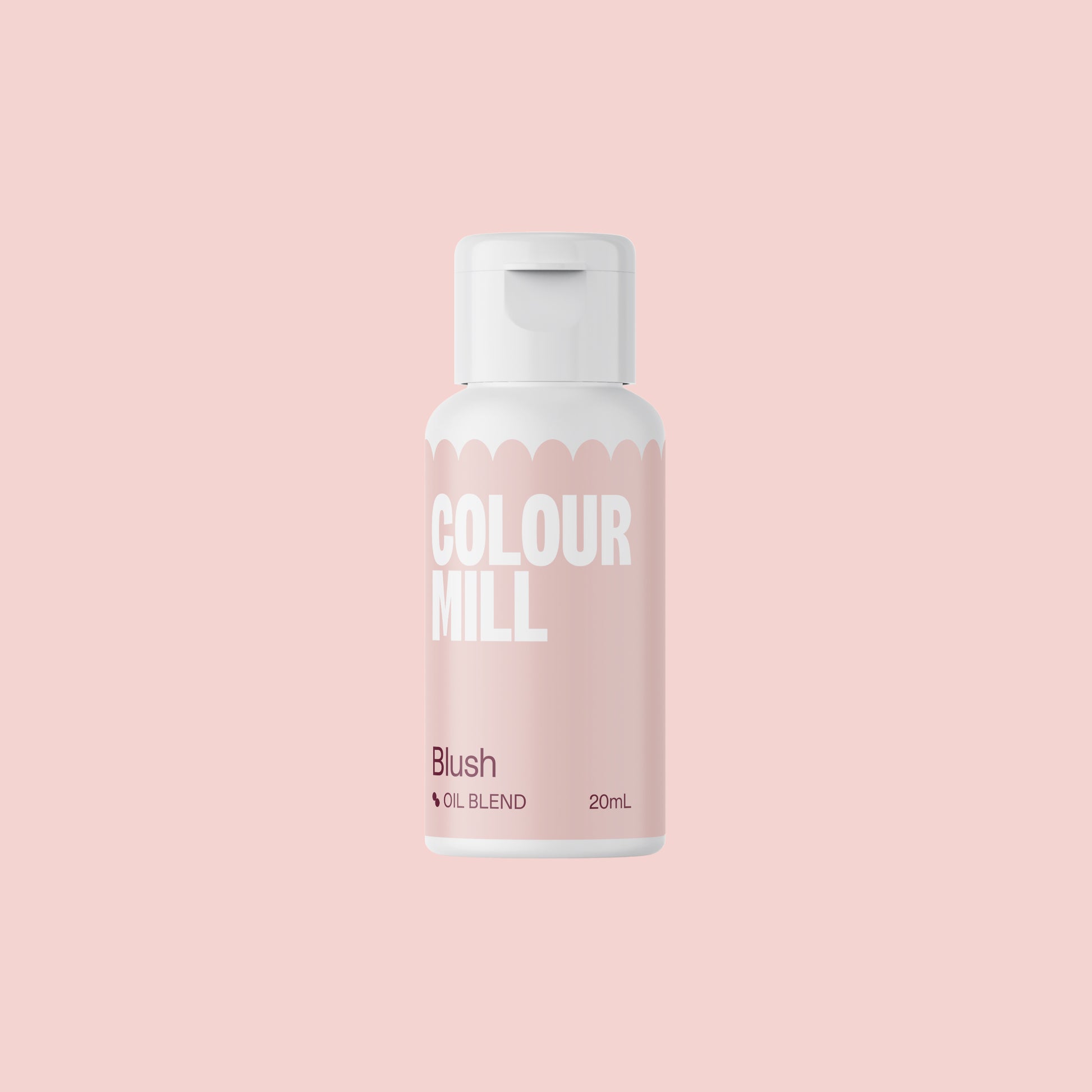 Bottle of Colour Mill Blush on a pink background