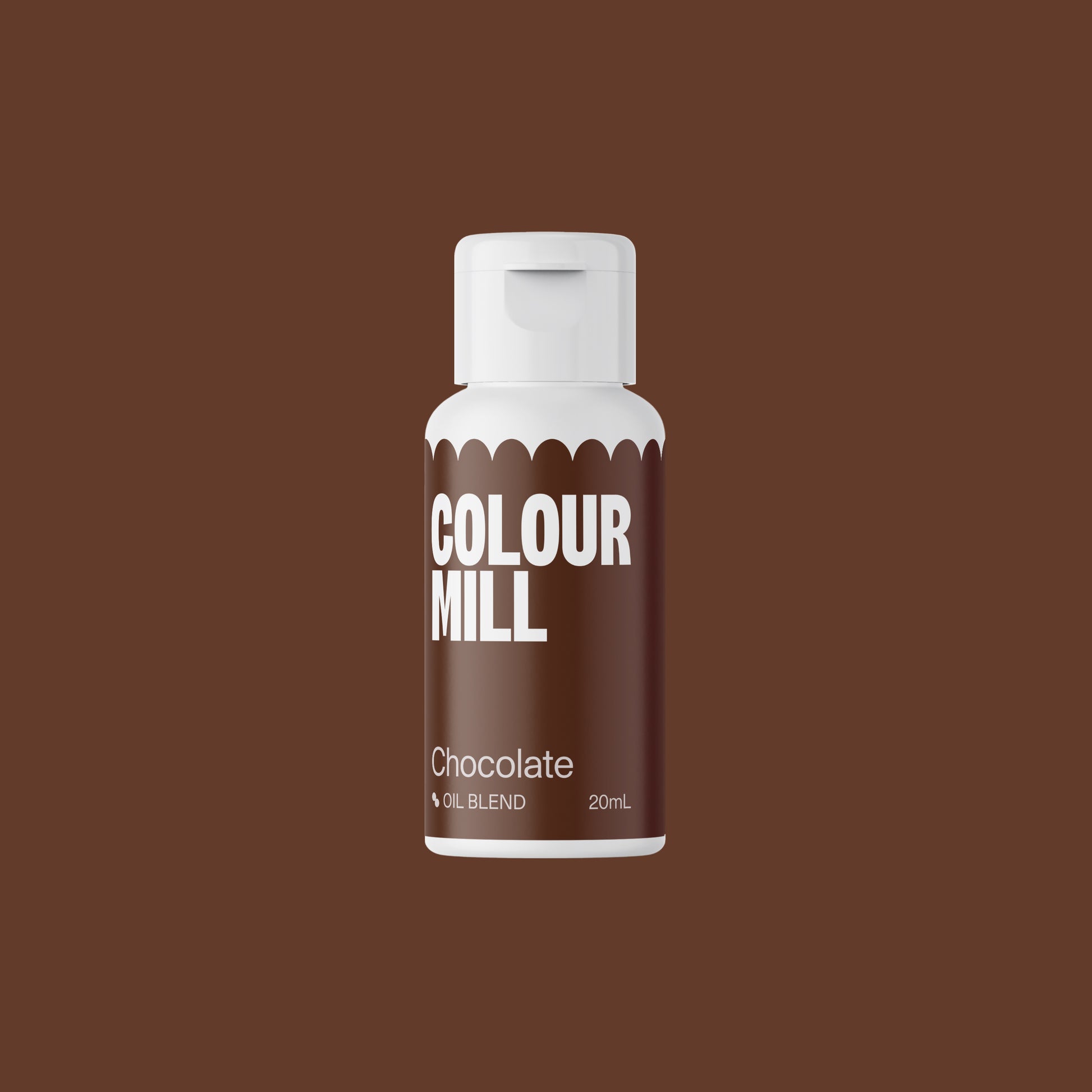 Bottle of Colour Mill chocolate colorant on a brown background