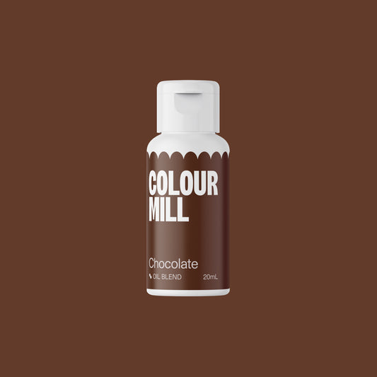 Bottle of Colour Mill chocolate colorant on a brown background