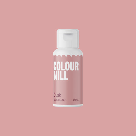 Colour Mill Dusk oil blend bottle on a pink background