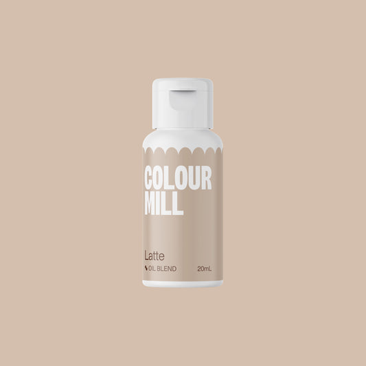Bottle of Colour Mill Latte oil blend on a beige background