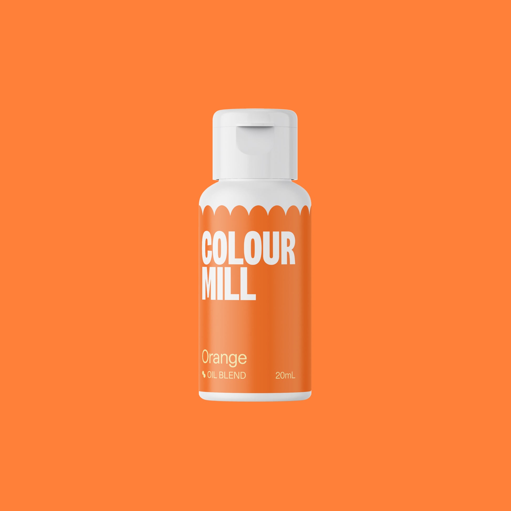 Bottle of Colour Mill Orange paint on an orange background
