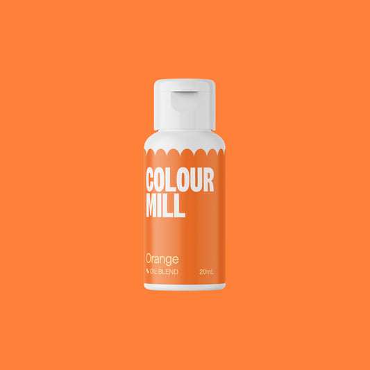 Bottle of Colour Mill Orange paint on an orange background