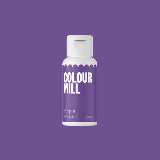 Bottle of Colour Mill purple colorant on a purple background