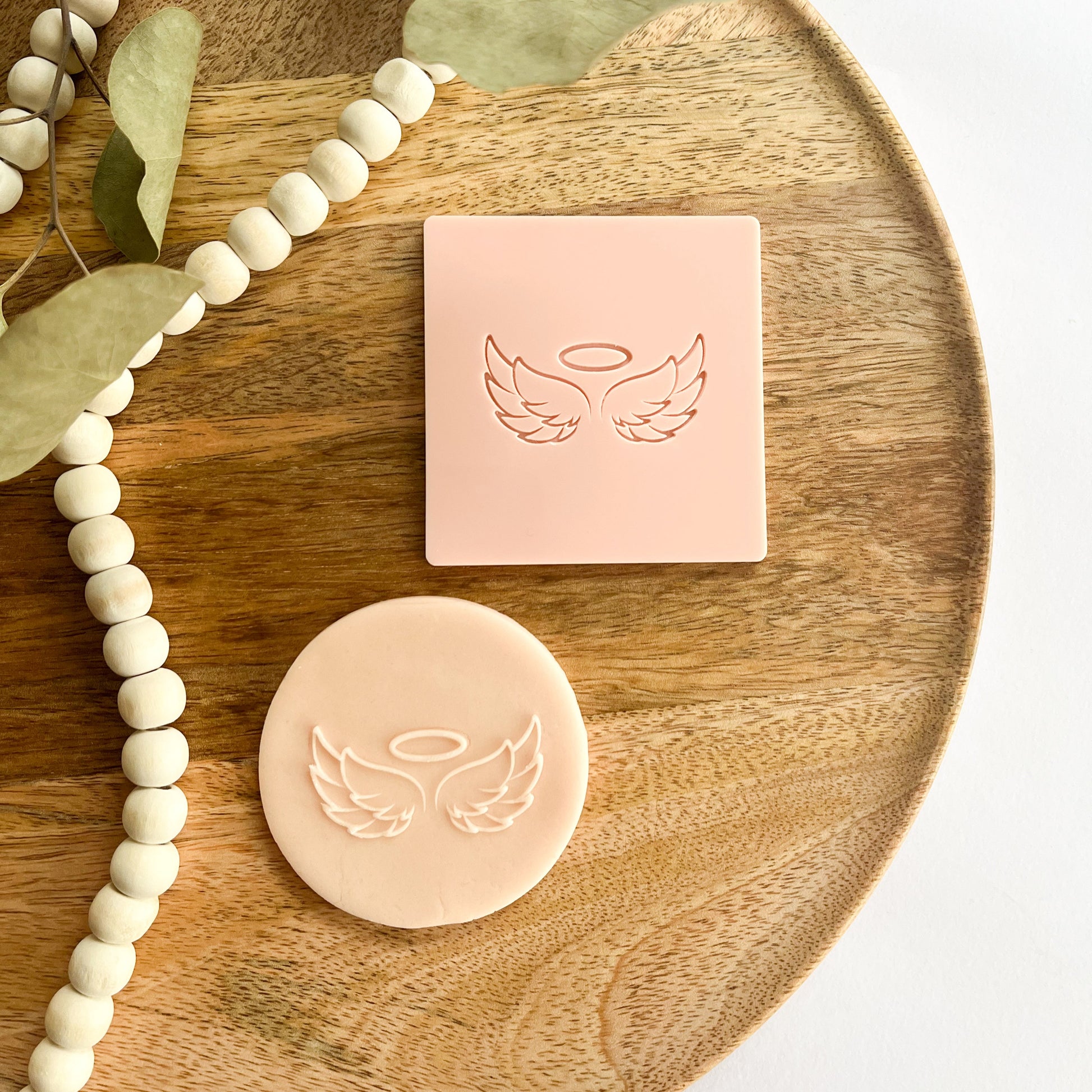 Cookie embosser with angel wings and halo, perfect for baby blessings, memorials, or spiritual events.