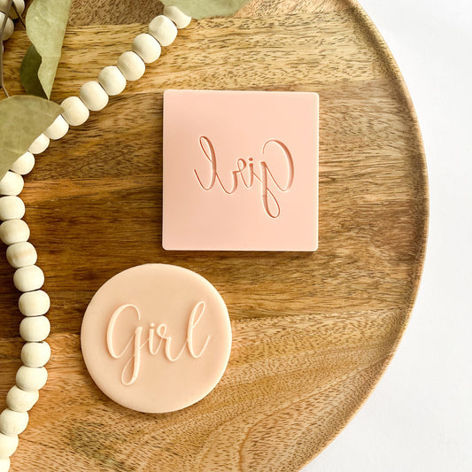 Create sweet baby girl cookies with this script “Girl” cookie embosser, ideal for baby showers and pink-themed bakes.