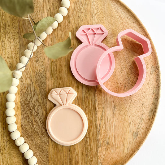 Diamond ring cookie cutter with matching embosser, perfect for engagement cookies, bridal showers, and wedding baking.