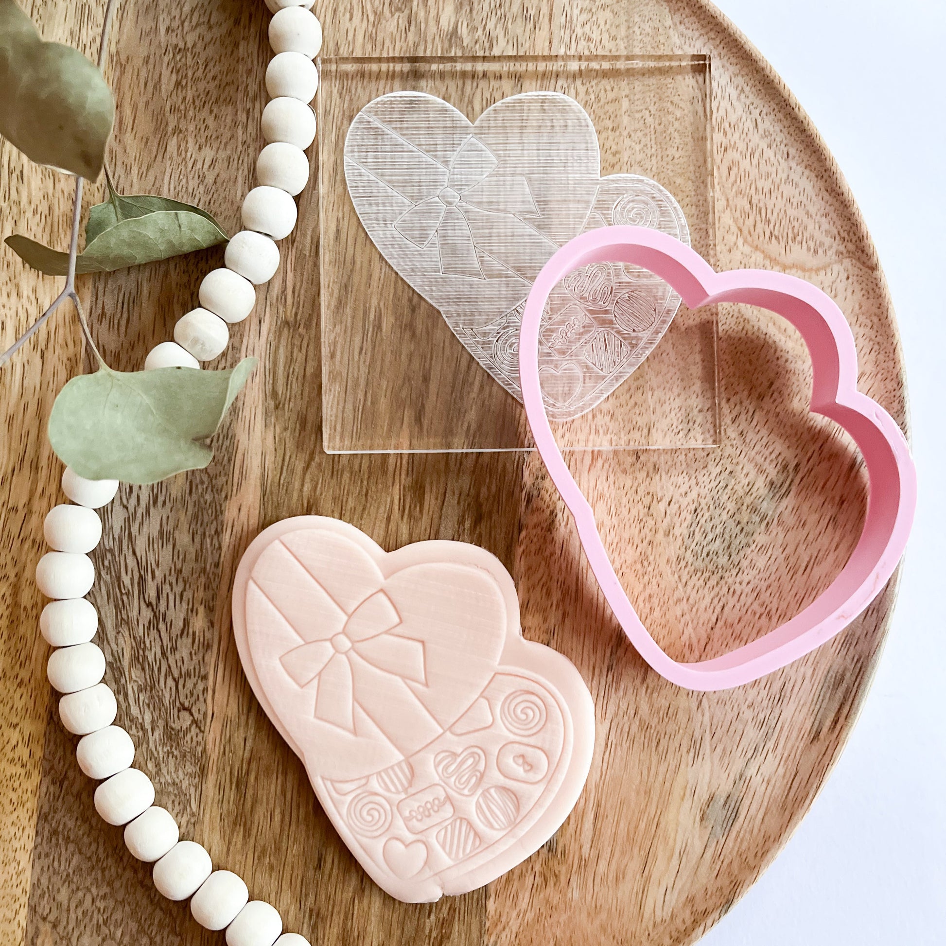 Heart cookie cutter with embossed floral petal design, perfect for spring baking, Mother’s Day treats, or fondant decorating.