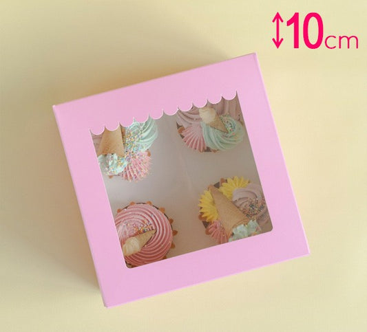 Pink cupcake box with a window displaying cupcakes on a beige background