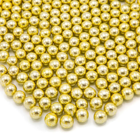 Gold metallic chocolate sprinkles – elegant edible decorations for cakes, cookies, and desserts.