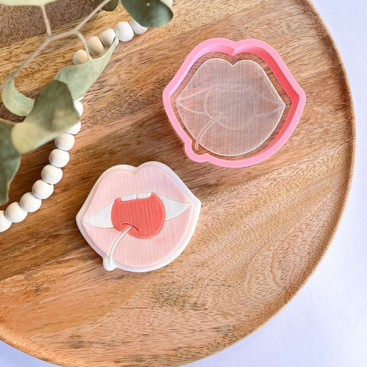 Cherry kiss embossed cookie cutter – a cute and playful design for romantic and fun cookies.