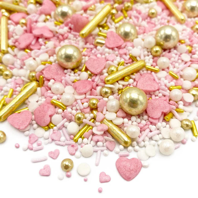 Princess Diary sprinkle mix – soft pink, gold, and white sprinkles for fairytale and birthday-themed cakes.