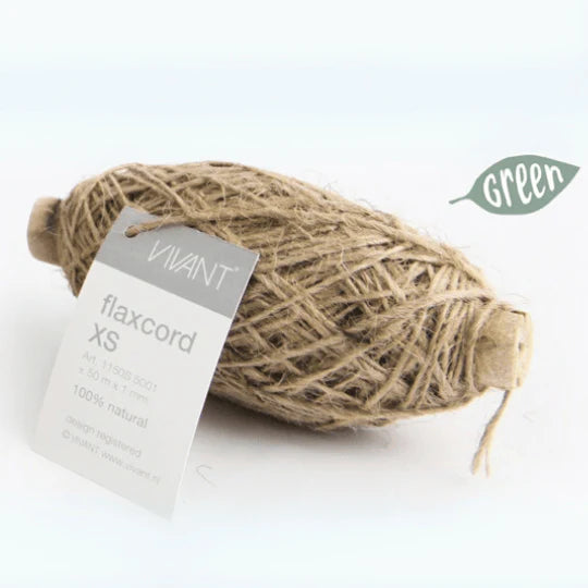 Ball of flaxcord with a label on a white background